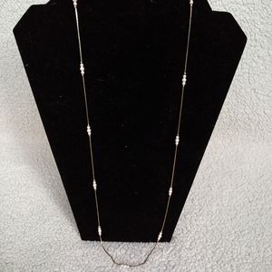 Gold necklace with faux pearls